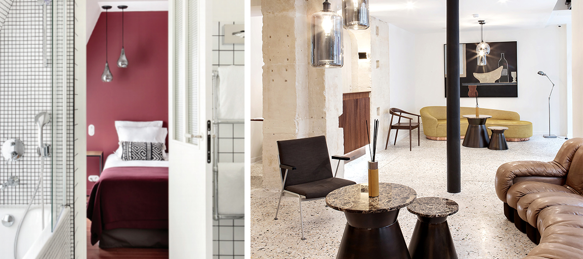 Hôtel Le Voltaire, Paris : Un mélange de modernité et d’authenticité, avec une chambre aux teintes bordeaux et un salon lumineux aux murs en pierre apparente. La salle de bain adopte un design graphique en carrelage noir et blanc.